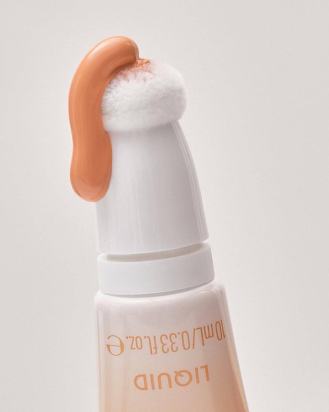 Корректор для области вокруг глаз жидкий Under Eye Brightener Liquid, 020 Warm Nude 2